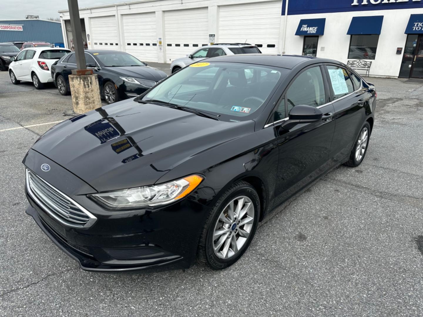 2017 BLACK Ford Fusion SE (3FA6P0HDXHR) with an 1.5L L4 DOHC 16V engine, 6A transmission, located at 1254 Manheim Pike, Lancaster, PA, 17601, (717) 393-9133, 40.062870, -76.323273 - Photo#0